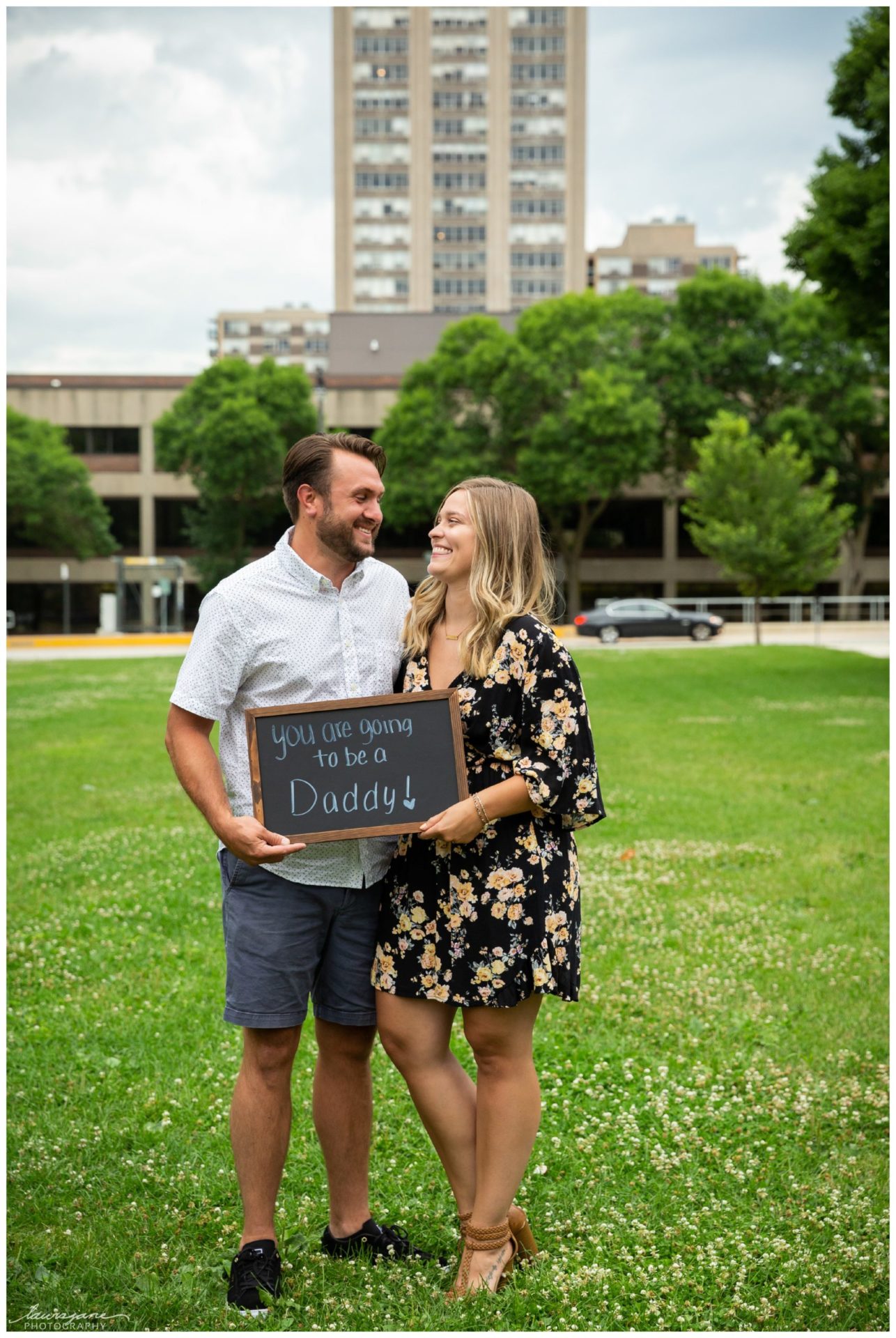 Happy couple after pregnancy reveal in Milwaukee WI