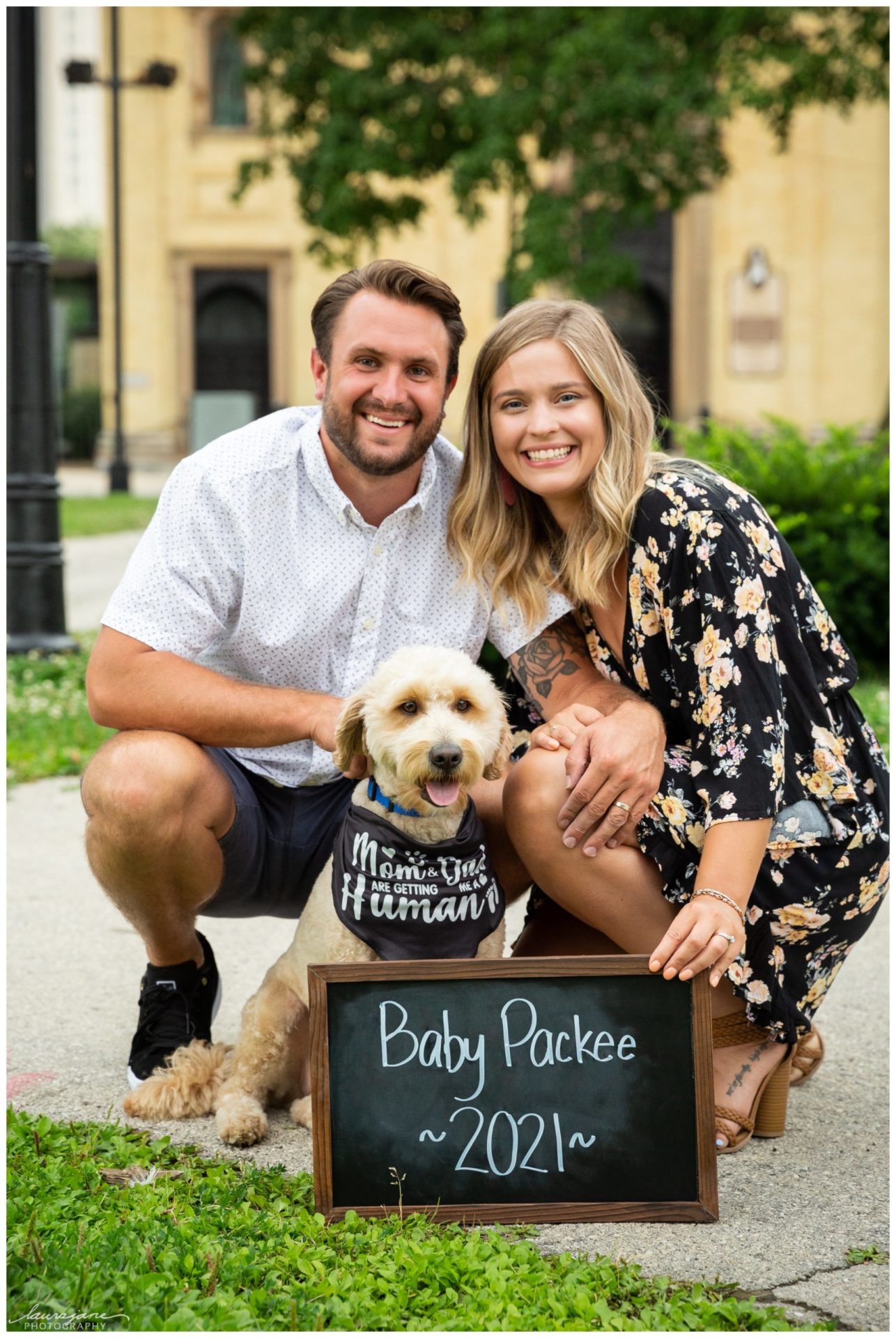 Pregnancy reveal portraits with puppy at Cathedral Square