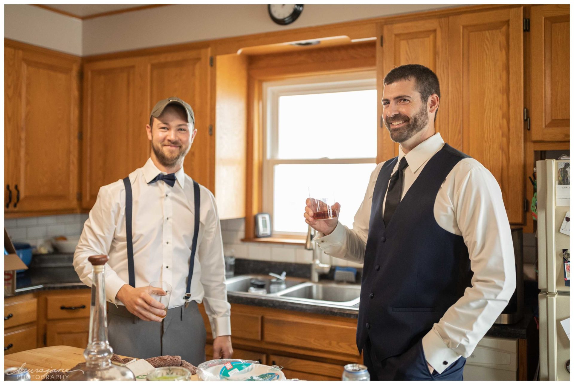 Groom Prep Laughing Candid